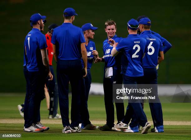 Mason Crane of The South celebrates with teammates after dismissing Sam Hain of The North during Game Three of the ECB North versus South Series at...