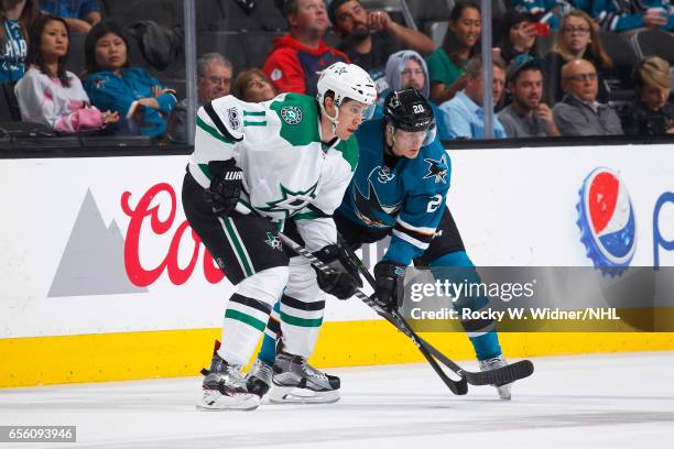 Curtis McKenzie of the Dallas Stars faces off against Marcus Sorensen of the San Jose Sharks at SAP Center on March 12, 2017 in San Jose, California.