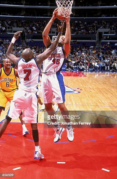 Sean Rooks of the Los Angeles Clippers rebounds the ball during the game against the Indiana Pacers at the STAPLES Center in Los Angeles, California....