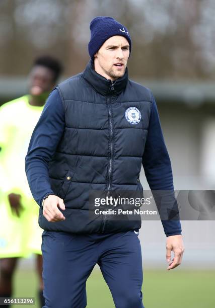 Peterborough United coach Jack Collison looks on prior to the friendly match between Northampton Town and Peterborough United at Fernie Fields on...