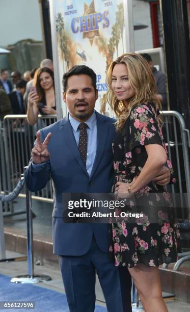 Actor Michael Peña and wife Brie Shaffer arrive for the Premiere Of Warner Bros. Pictures' "CHiPS" held at TCL Chinese Theatre on March 20, 2017 in...