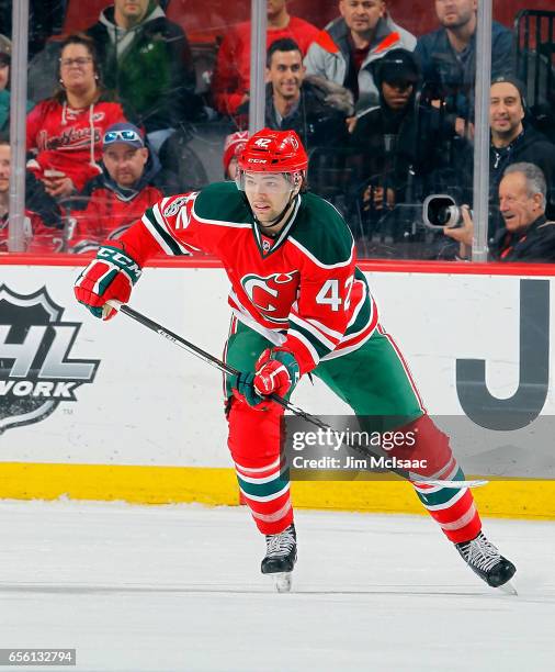 John Quenneville of the New Jersey Devils in action against the Philadelphia Flyers on March 16, 2017 at Prudential Center in Newark, New Jersey. The...