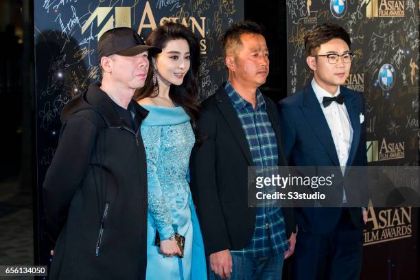 Director Feng Xiaogang of China, actress Fan Bingbing of China, Luo Pan of China and actor Dong Chengpeng of China pose on the red carpet during the...