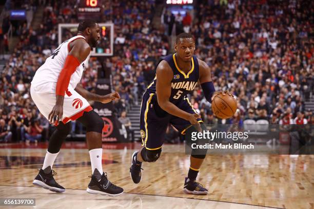 Lavoy Allen of the Indiana Pacers looks to pass the ball against the Toronto Raptors on March 19, 2017 at Air Canada Centre in Toronto, Ontario,...