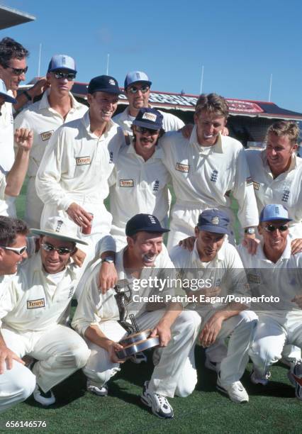 England captain Mike Atherton holds the series trophy after England won the 3rd Test match between New Zealand and England and took the three-match...