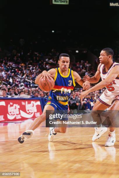 Chris Jackson of the Denver Nuggets dribbles against the New York Knicks during a game played circa 1993 at the Madison Square Garden in New York...