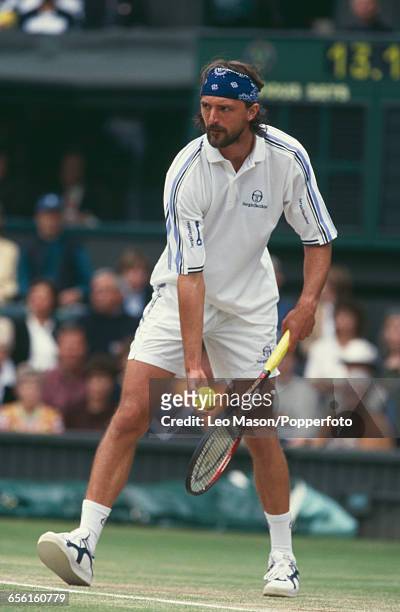 Croatian tennis player Goran Ivanisevic pictured competing to progress to reach the final of the Men's Singles tournament before losing to Pete...