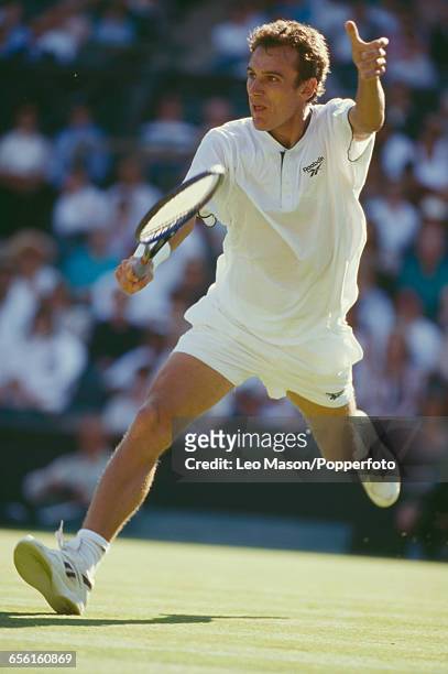 Swedish tennis player Mats Wilander pictured in action during competition to reach the third round of the Men's Singles tournament at the Wimbledon...