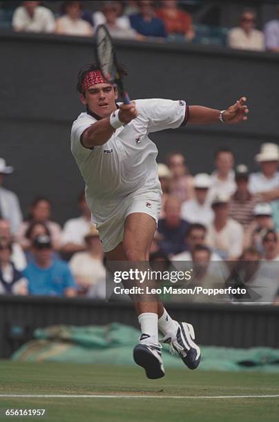 Australian tennis player Mark Philippoussis pictured in action during competition to reach the second round of the Men's Singles tournament at the...