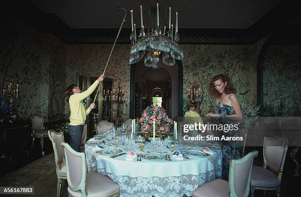 Philanthropist Ann Getty, the wife of millionaire oil tycoon Gordon Getty, with two of their four sons, Andrew 1967 - 2015, left) and Billy, at their...