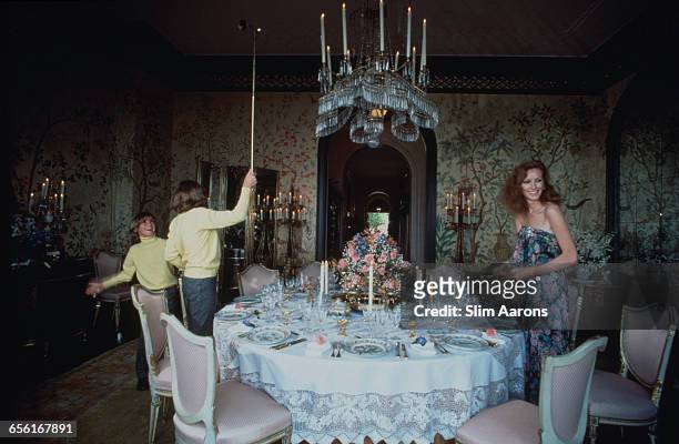 Philanthropist Ann Getty, the wife of millionaire oil tycoon Gordon Getty, with two of their four sons, Andrew 1967 - 2015, centre) and Billy, at...