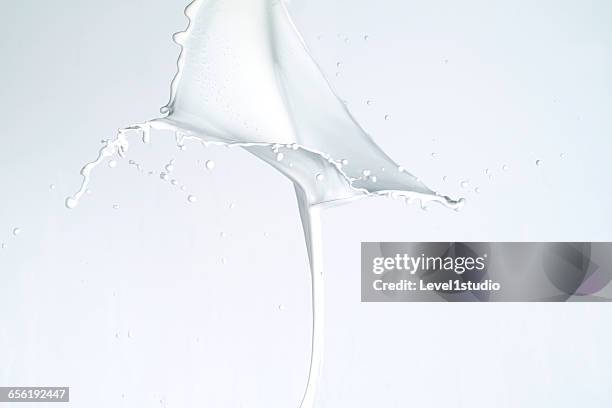 splashing of the milk - pure stock pictures, royalty-free photos & images