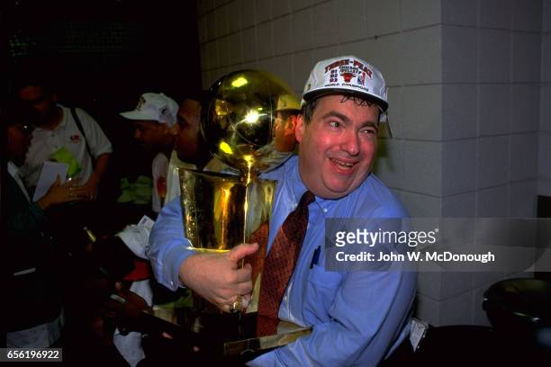 Finals: Chicago Bulls General Manager Jerry Krause victorious with Larry O'Brien Trophy after winning third championship at America West Arena....