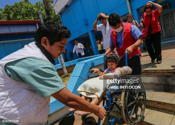 Patients at the Manuel de Jesús Rivera Children's Hospital "La Mascota" collaborate in a national disaster prevention drill, as a preparation in case...