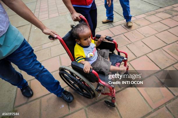 Patients at the Manuel de Jesús Rivera Children's Hospital "La Mascota" take part in a national disaster prevention drill, as a preparation in case...