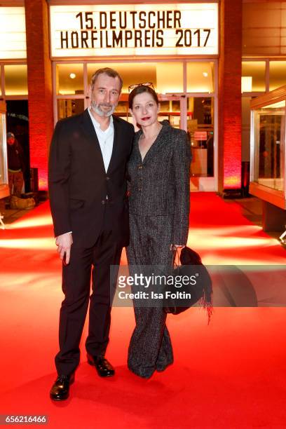 Austrian actor Heikko Deutschmann and hsi wife Iris Boehm arrive at the Deutscher Hoerfilmpreis at Kino International on March 21, 2017 in Berlin,...
