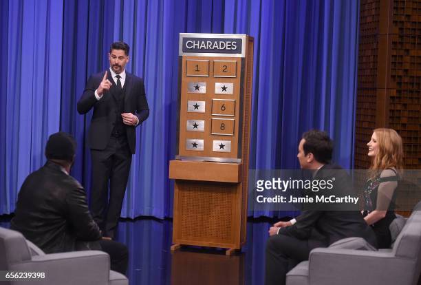 Tariq Trotter of the Roots,Joe Manganiello, host Jimmy Fallon and Jessica Chastain play charades during a segement on "The Tonight Show Starring...