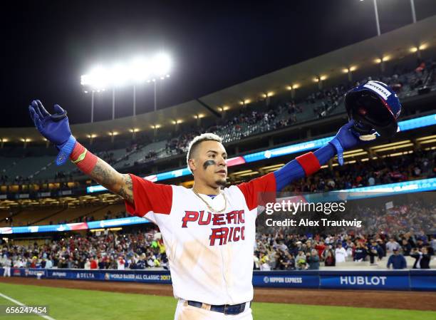 Javier Baez of Team Puerto Rico celebrates after Game 1 of the Championship Round of the 2017 World Baseball Classic against Team Netherlands on...