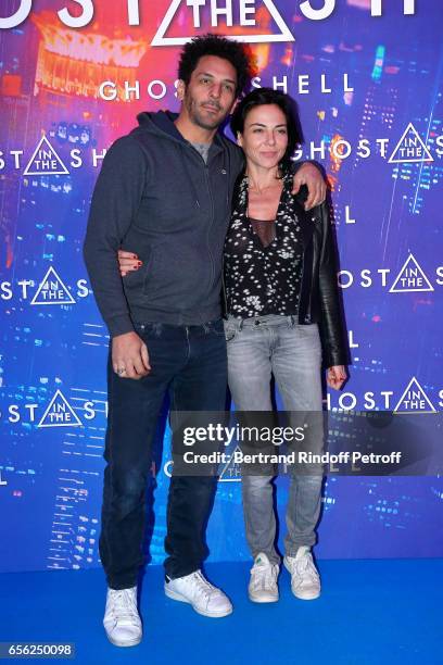 Tomer Sisley and Sandra Zeitoun de Matteis attend the Paris Premiere of the Paramount Pictures release "Ghost in the Shell". Held at Le Grand Rex on...