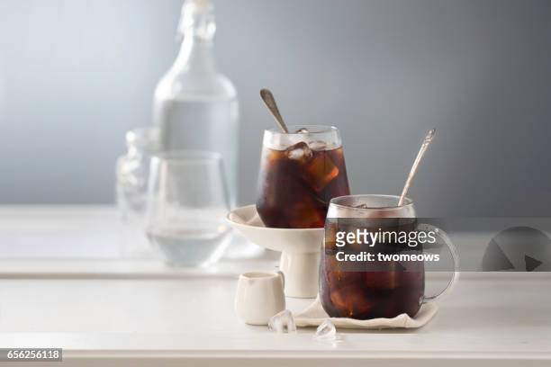 two cup of iced black coffee. - iced coffee foto e immagini stock