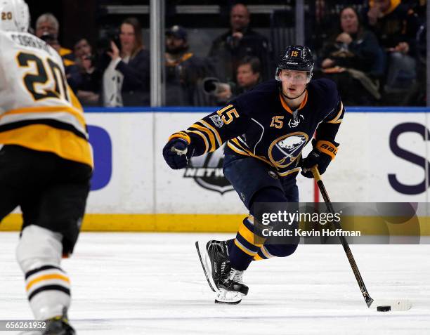 Jack Eichel of the Buffalo Sabres skates by Frank Corrado of the Pittsburgh Penguins during the second period at the KeyBank Center on March 21, 2017...