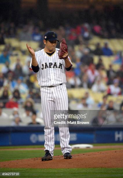 Tomoyuki Sugano of Team Japan reacts on the mound during Game 2 of the Championship Round of the 2017 World Baseball Classic against Team USA on...