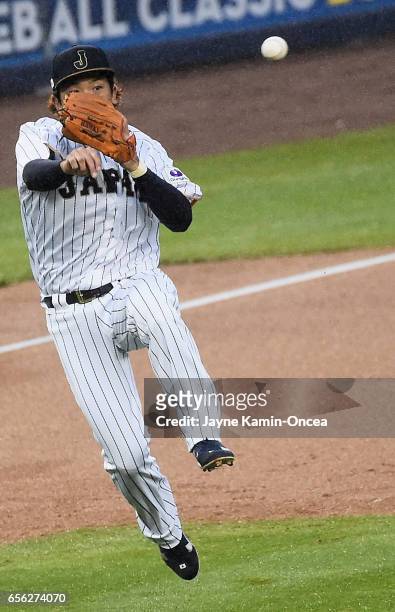 Nobuhiro Matsuda of team Japan throws out Eric Hosmer of team United States in the second inning during Game 2 of the Championship Round of the 2017...