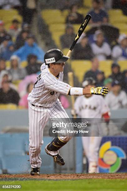 Seiji Kobayashi of team Japan singles in the third inning against team United States during Game 2 of the Championship Round of the 2017 World...