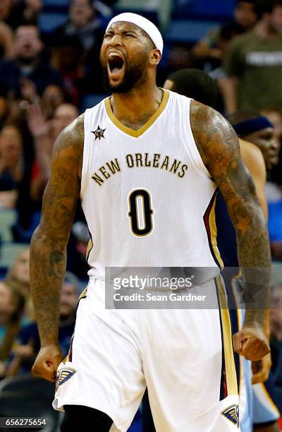 DeMarcus Cousins of the New Orleans Pelicans reacts after an assist against the Memphis Grizzlies during the second half at the Smoothie King Center...