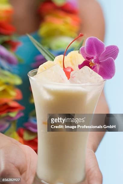 woman serving pia colada - americana aloe stock pictures, royalty-free photos & images