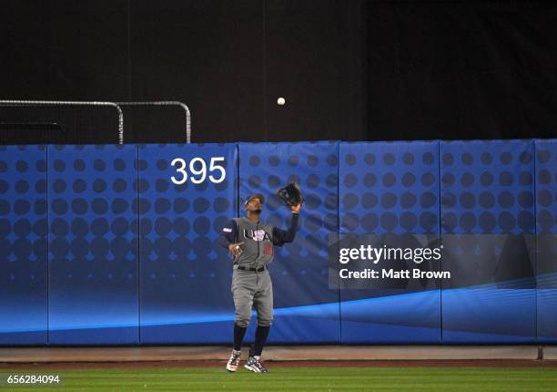 Adam Jones of Team USA makes the catch in the fifth inning of Game 2 of the Championship Round of the 2017 World Baseball Classic against Team Japan...