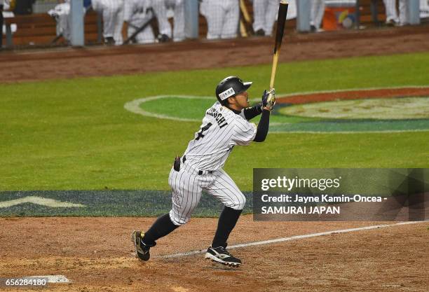 Ryosuke Kikuchi of team Japan hits a game-tying home run in the sixth inning against team United States during Game 2 of the Championship Round of...