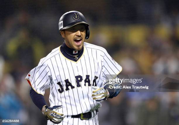 Ryosuke Kikuchi of Team Japan celebrates as he crosses the plate after hitting a solo home run in the sixth inning of Game 2 of the Championship...