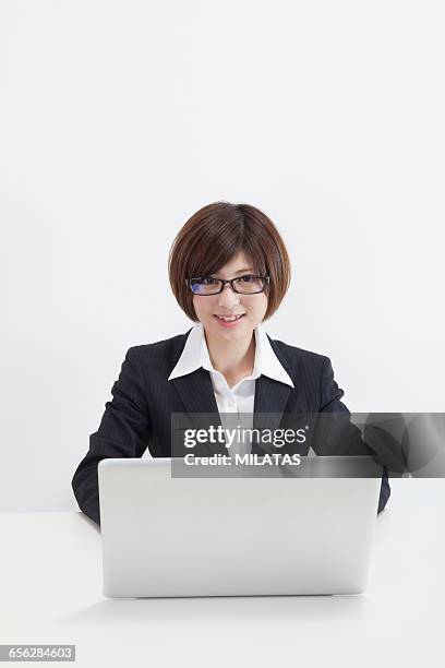 japanese female company employee to a personal computer - newbie stock pictures, royalty-free photos & images