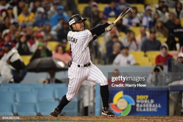 Ryosuke Kikuchi of team Japan hits a game-tying home run in the sixth inning against team United States during Game 2 of the Championship Round of...