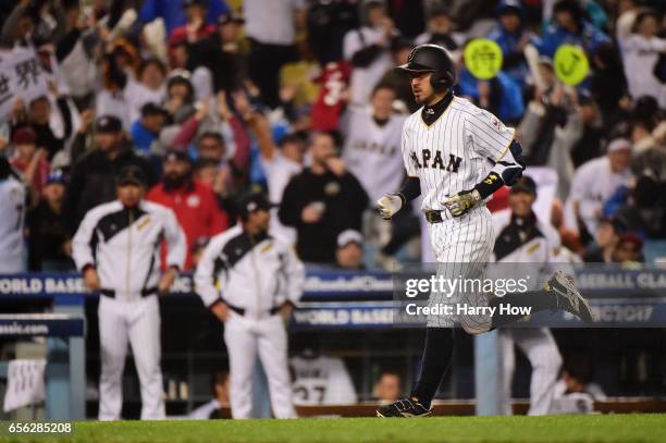Ryosuke Kikuchi of team Japan rounds the bases after a game-tying home run in the sixth inning against team United States during Game 2 of the...