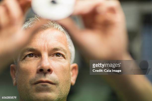 focused worker examining part in steel factory - technician stock pictures, royalty-free photos & images