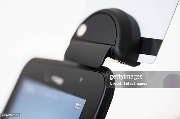 smart phone with credit card reader - smart card reader stock pictures, royalty-free photos & images