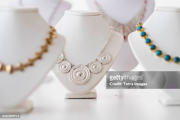 necklaces on display - jewellery products stock pictures, royalty-free photos & images