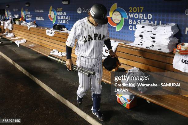 Infielder Nobuhiro Matsuda of Japan is seen in the dugout after his team's defeat against the United States in the World Baseball Classic...