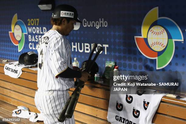 Infielder Nobuhiro Matsuda of Japan is seen in the dugout after his team's defeat against the United States in the World Baseball Classic...