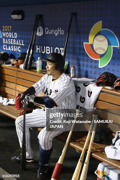 Infielder Nobuhiro Matsuda of Japan shows dejection in the dugout after his team's defeat against the United States in the World Baseball Classic...