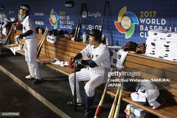 Infielder Nobuhiro Matsuda of Japan shows dejection in the dugout after his team's defeat against the United States in the World Baseball Classic...