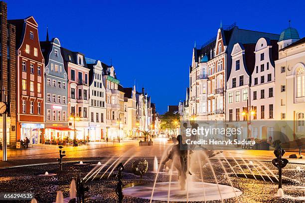 fountain on university square in rostock rostock, mecklenburg-vorpommern, germany - rostock stock pictures, royalty-free photos & images