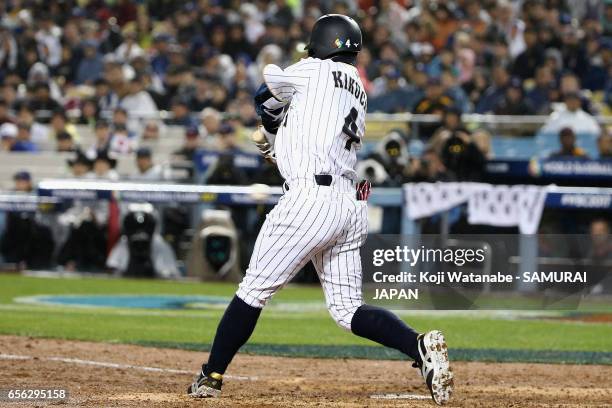 Infielder Ryosuke Kikuchi of Japan hits a solo homer in the bottom of the sixth inning during the World Baseball Classic Championship Round Game 2...