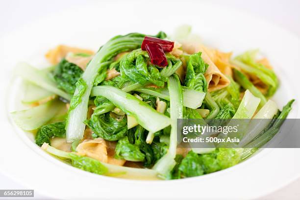 fried spinach with tofu - nata de soja fotografías e imágenes de stock