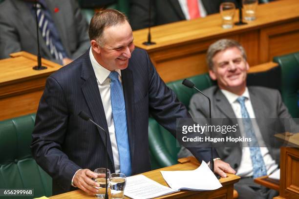 Former Prime Minister John Key delivers his farewell speech while current Prime Minister Bill English looks on at Parliament on March 22, 2017 in...