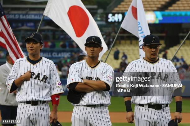 Infielder Hayato Sakamoto, Infielder Sho Nakata and Outfielder Yoshitomo Tsutsugoh of Japan are seen prior to the World Baseball Classic Championship...