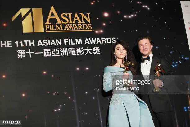 Chinese actress Fan Bingbing, winner of the Best Actress award for film 'I Am Not Madame Bovary', and Japanese actor and musician Tadanobu Asano,...