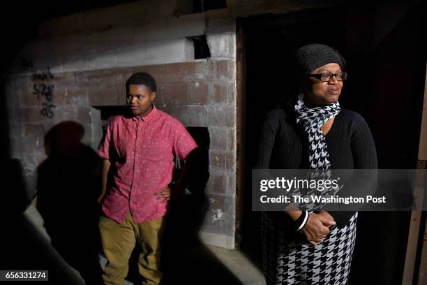 Valerie Scott tours the unfinished basement at the Dubois Community Center in Mount Sterling. The center is currently being revitalized through...